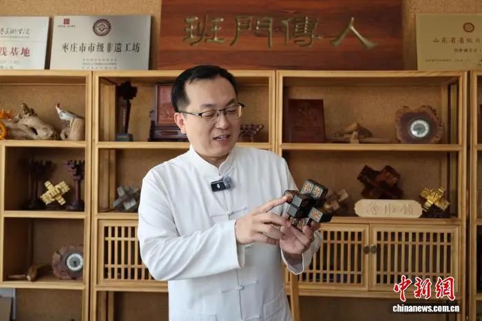 央媒聚焦丨中国新闻网报道圣匠鲁班文创，非遗鲁班锁让千年智慧焕发新生机